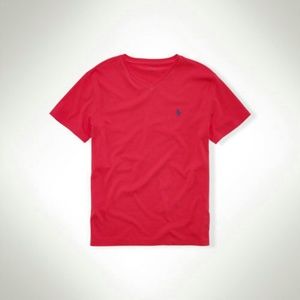 red nike slides with gold check